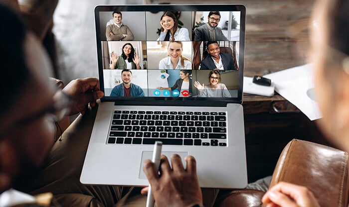 Employees connecting with eachother during a video call