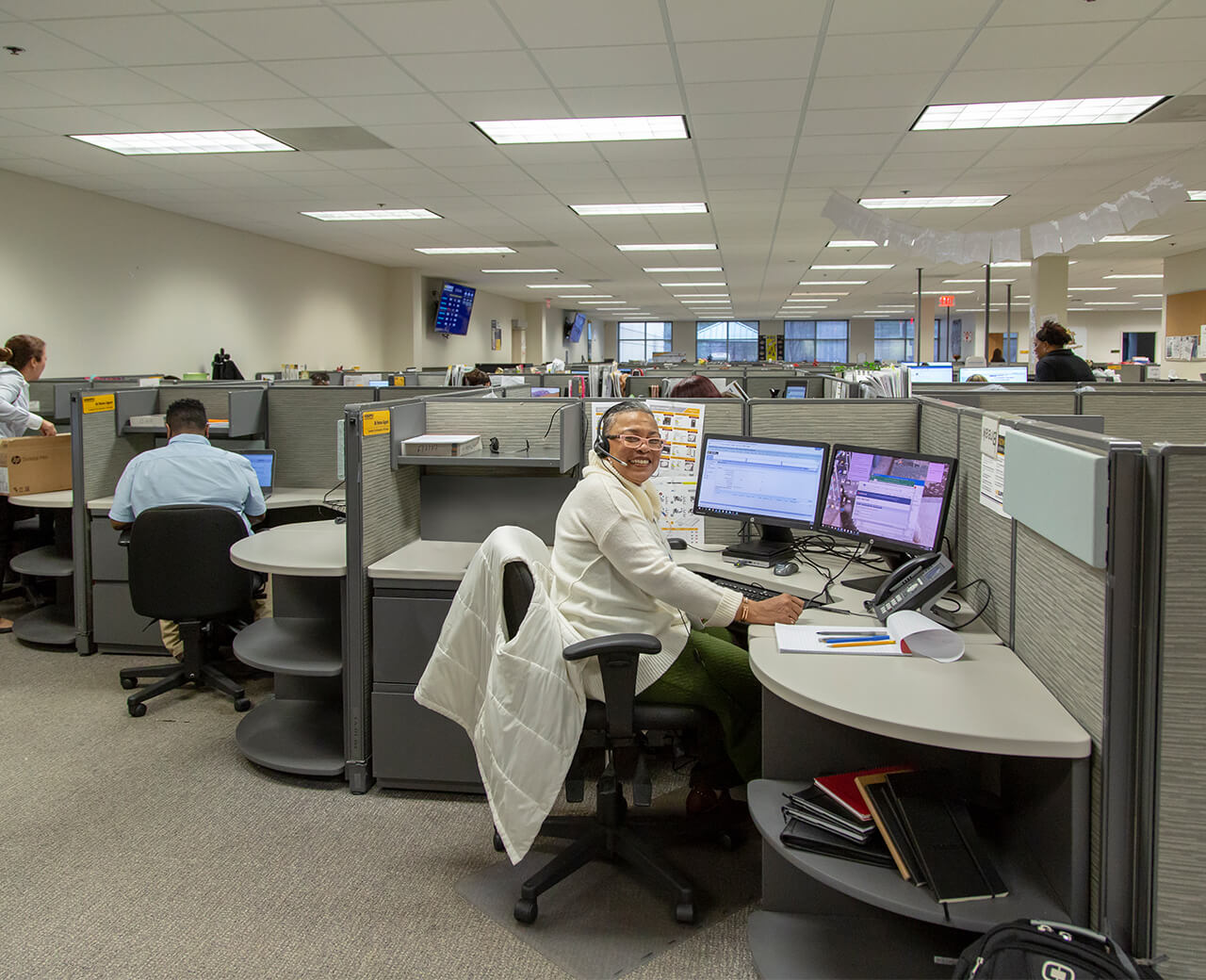 HD Supply personnel in a shared office environment