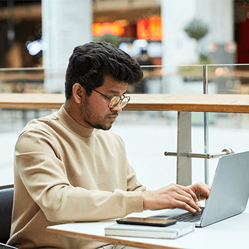 Man working remotely from laptop