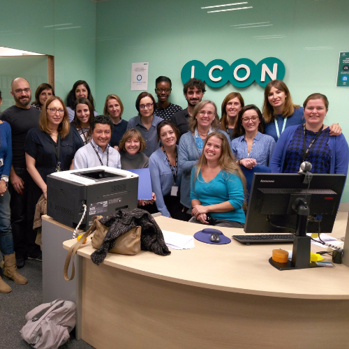 Team picture of ICON employees in an office